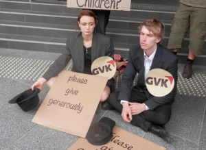 Queenslanders protest at the Annual General Meeting of rail company Aurizon in Brisbane to demand the company pull out of plans to build a railway line to connect new coal mines in the Galilee Basin to the controversial port development at Abbot Point beside the Great Barrier Reef. Photo (c) Greenpeace Australia Pacific