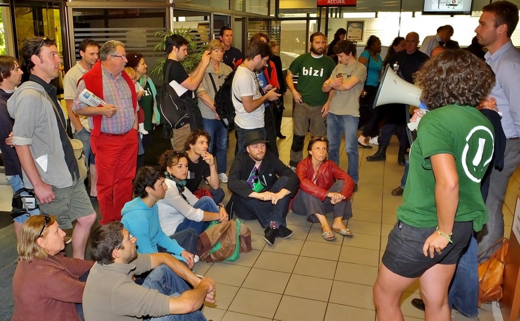 Market Forces joins Bizi! and Friends of the Earth France in Societe Generale occupation, Bayonne, France.