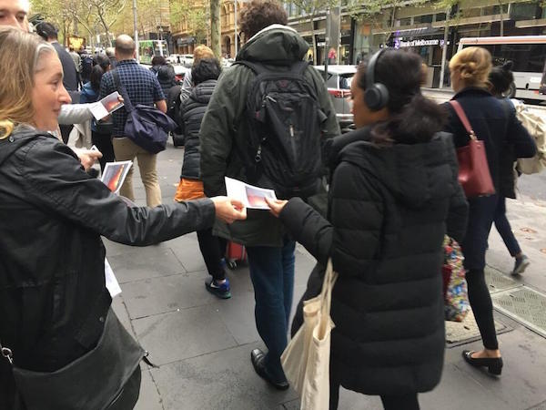 Market Forces volunteers hand out Suncorp leaflets
