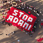 Stop-Adani-human-sign-Townsville-ubermenu-150px-min