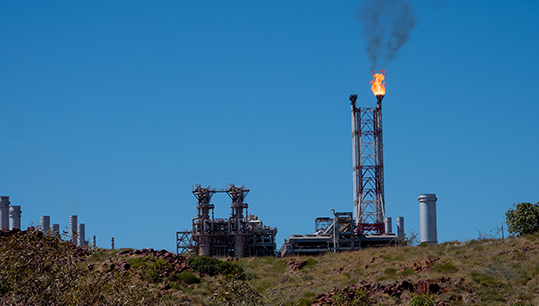 Gas flaring at Woodside’s Pluto LNG processing facility. Image courtesy of CCWA Gas flaring at Woodside’s Pluto LNG processing facility. Image courtesy of CCWA