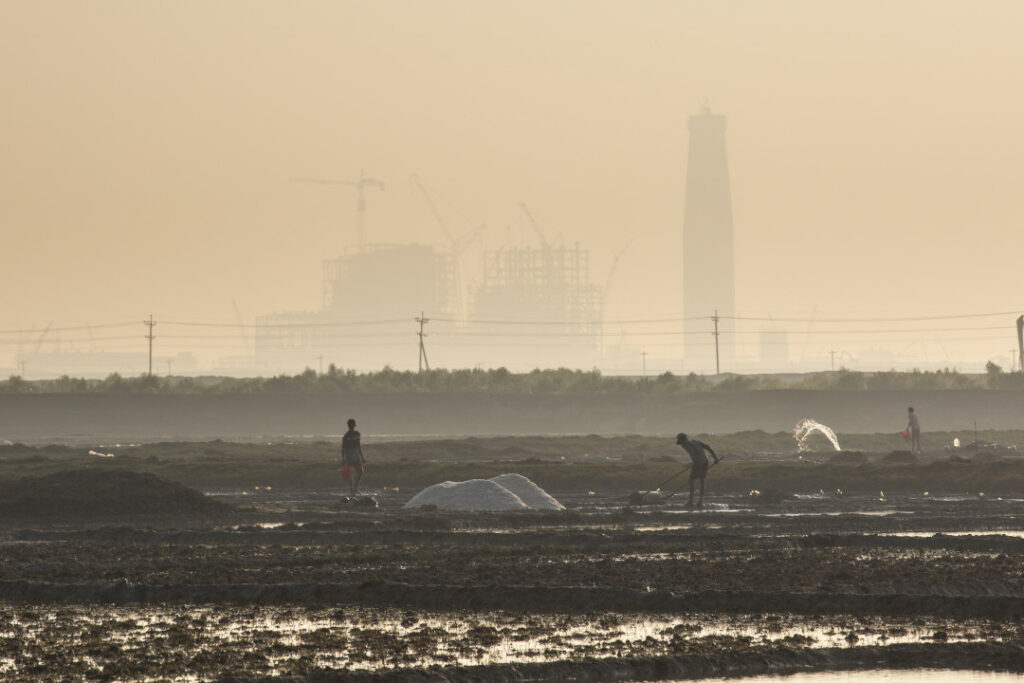 Salt farmers working near the Matarbari coal-fired power project construction site in Cox's Bazar District, Bangladesh. Photo credit: Noor Alam